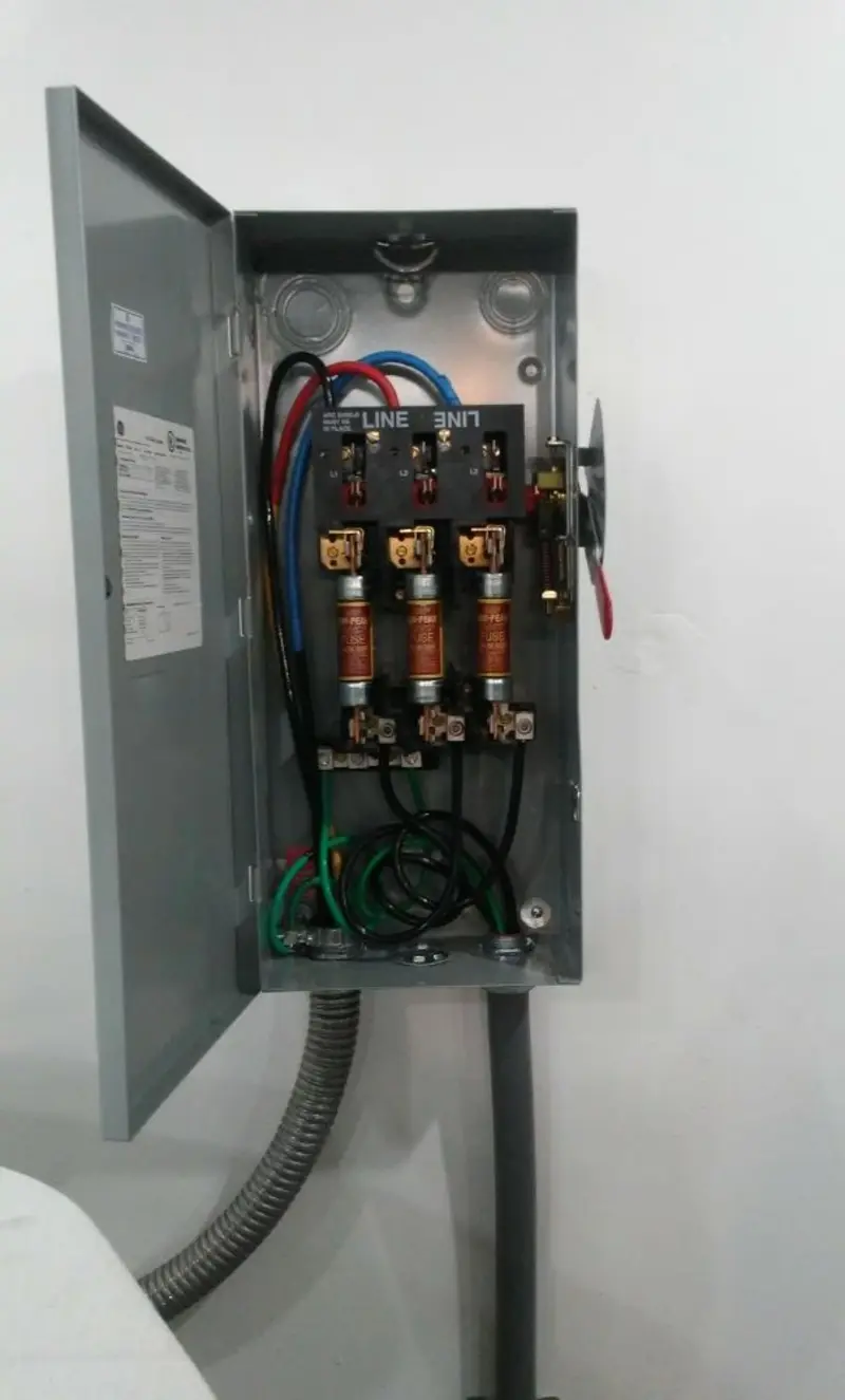 Three-phase disconnect switch installed for Smoke Detector Installation in Eden